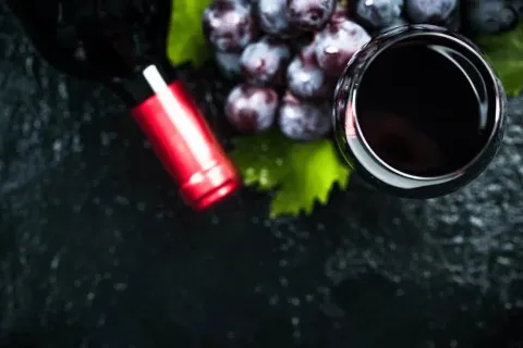 Red wine on dark slate